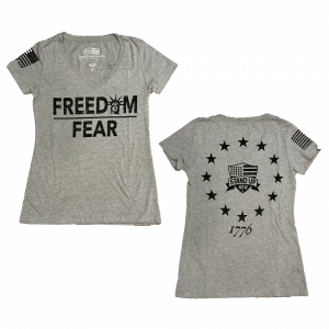Stand Up Boldly and show your American patriotism in this comfortable womens V-neck shirt. FREEDOM over FEAR is the perfect expression of what a patriotic shirt should be. 1776 betsy ross flag on the back. Shirt comes in many colors - grey - pink - black - navy - green and more colors