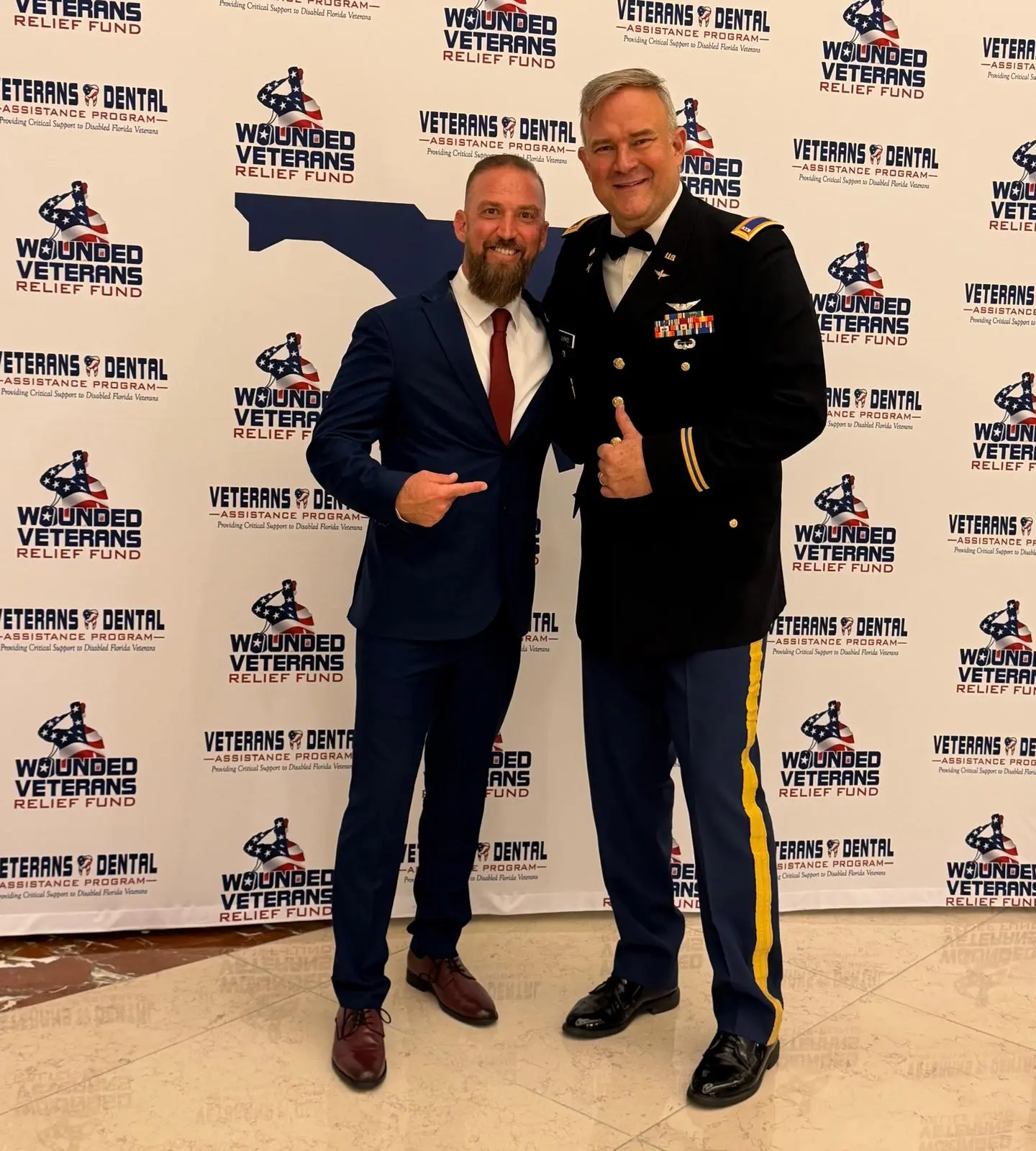 Christian Apparel That Gives Back 4 Gerard White with a United States Army officer at the WVRF gala